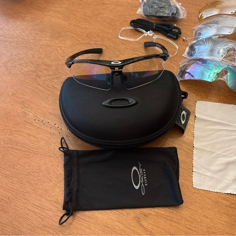 Oakley Black Sunglasses and Protective Case with Multiple Lenses